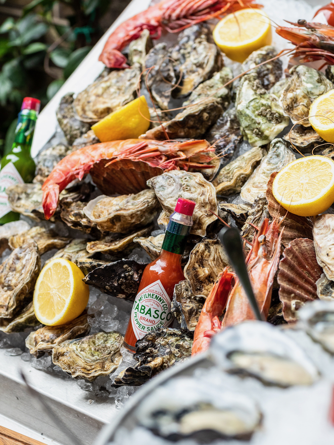 The-MAINE-Mayfair-Terrace-oysters-tabasco